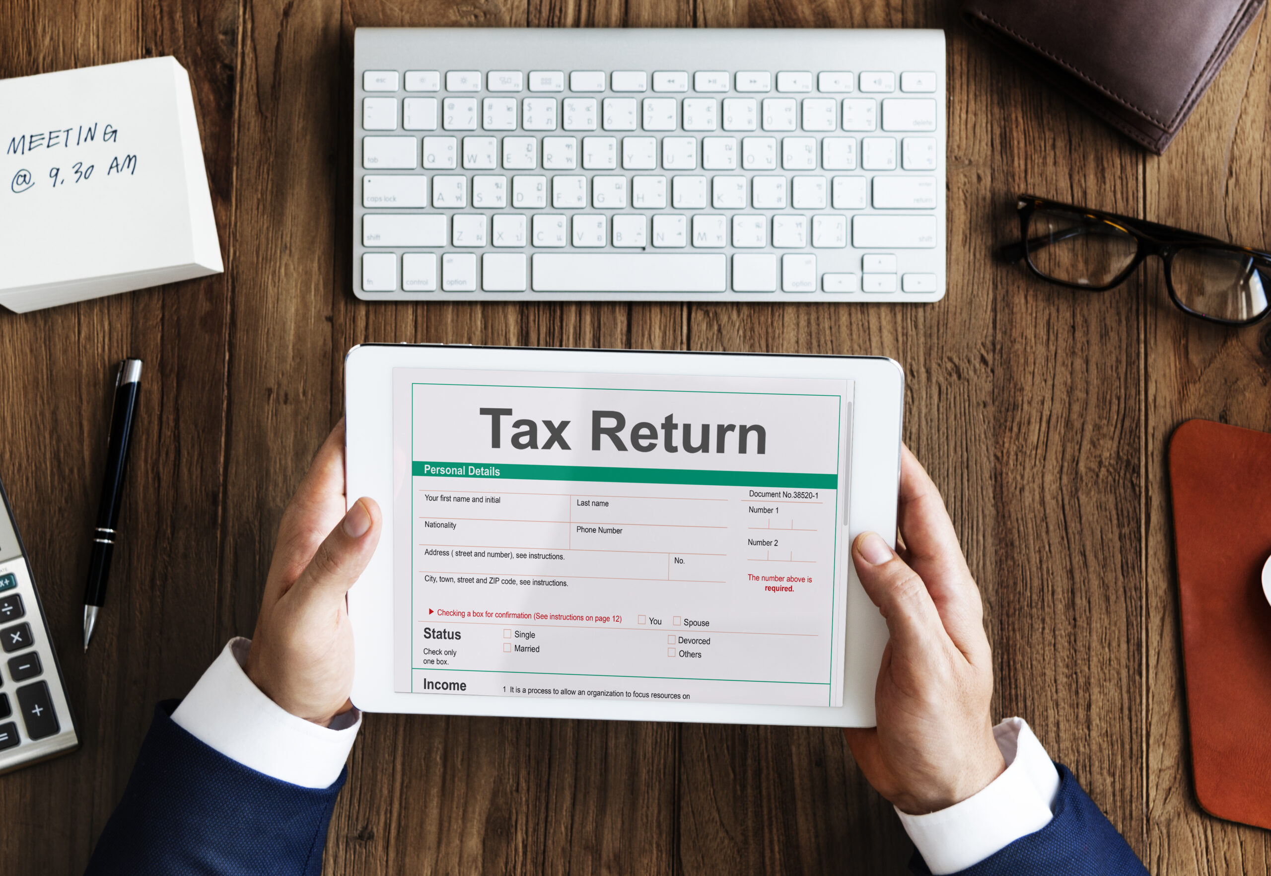 income tax return deduction refund concept scaled